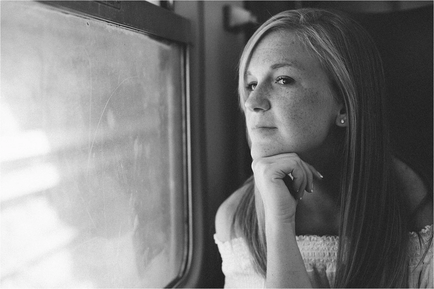  Kirsten contemplating her life as babies scream on the train.&nbsp; 