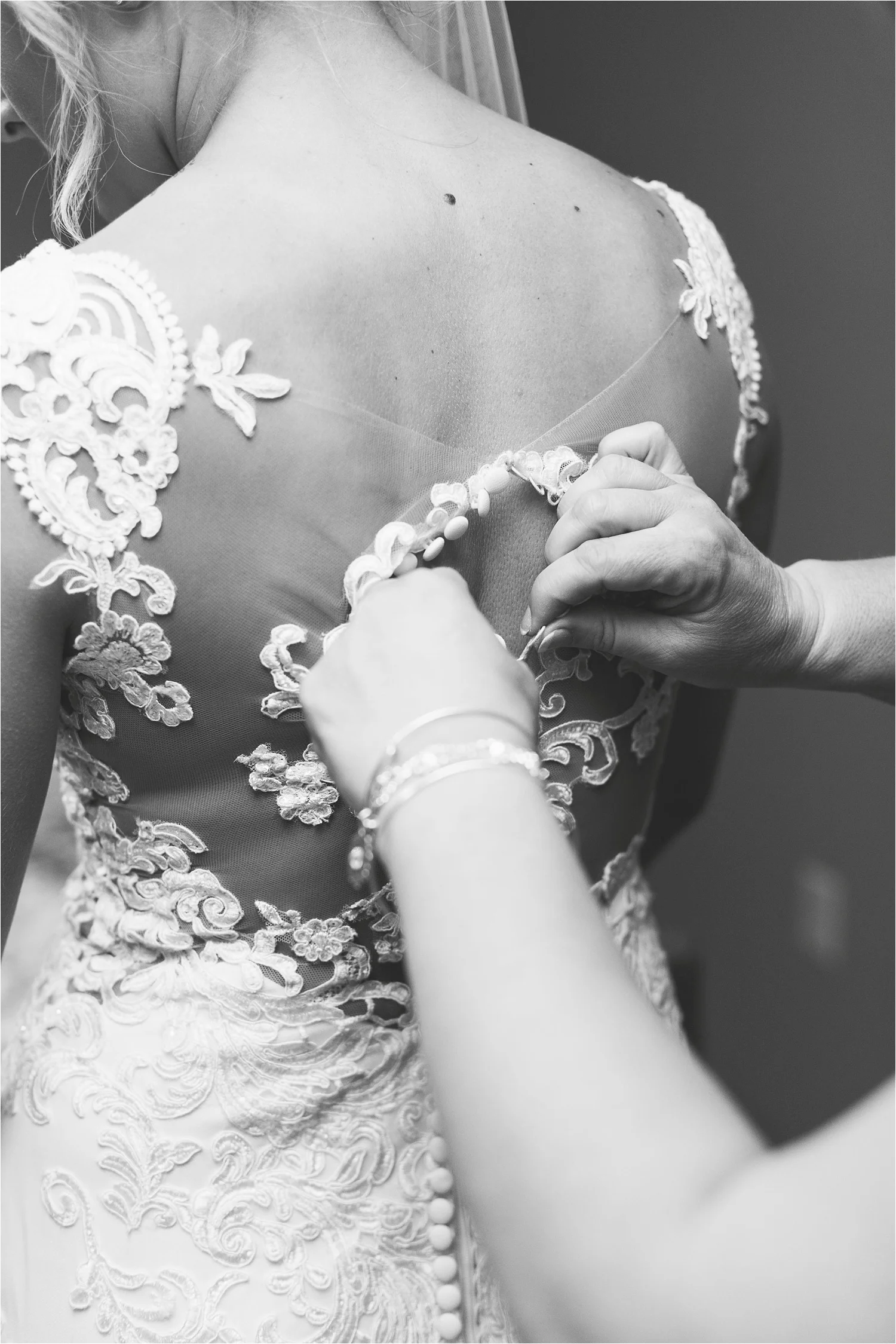  There’s nothing like your mom helping you get into your dress on one of the best days of your life. :) 