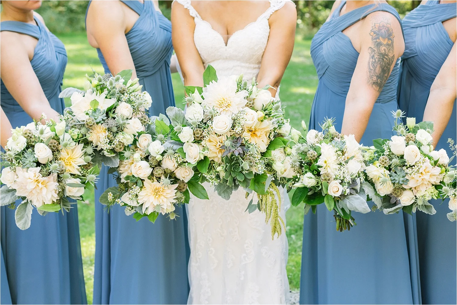  Slate blue and beautiful blooms. Jess did a great job choosing all of her wedding details. 