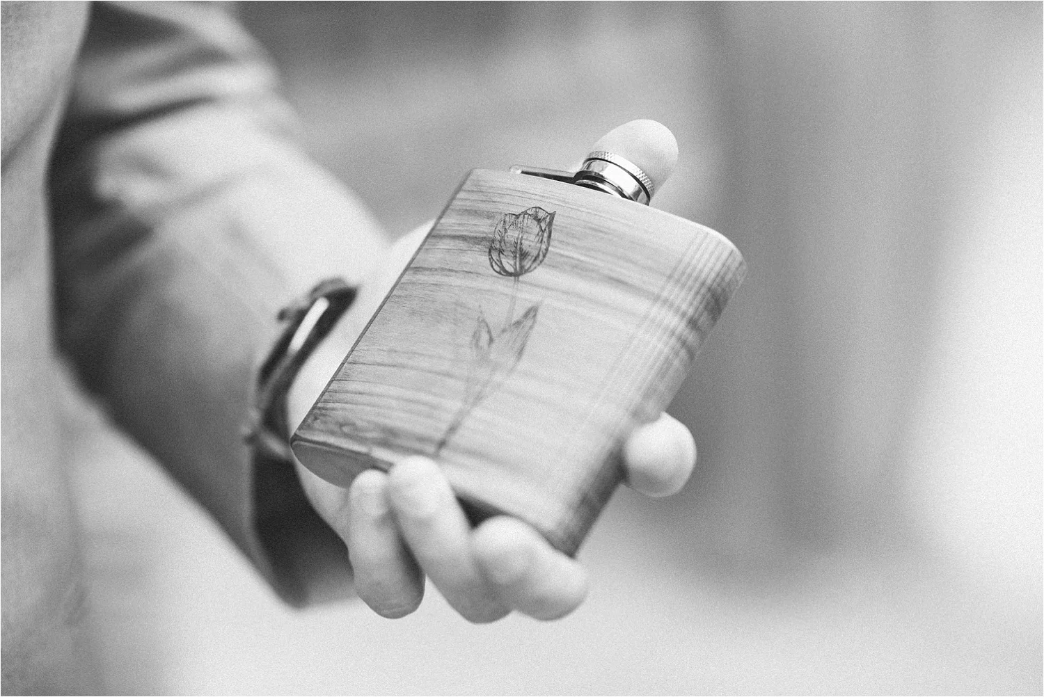  One of my favorite details of the year is this custom flask. Great find! 