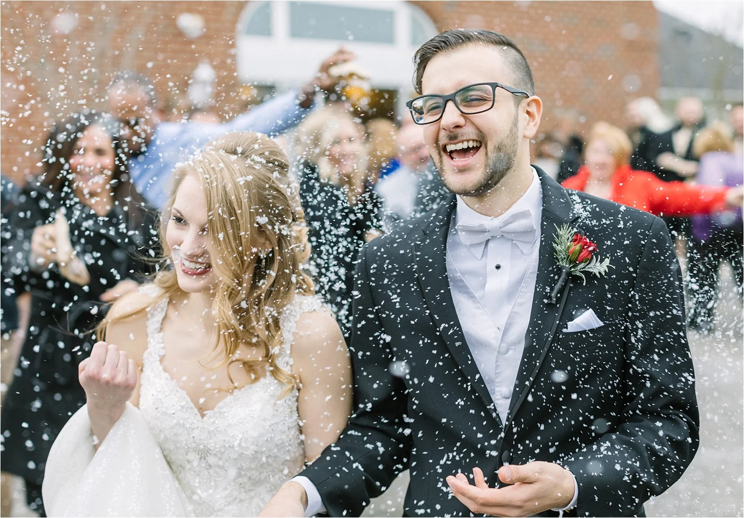  This was our last wedding of 2018! Donny & I photographed this just last weekend, so while we don’t have a full gallery of edited images to choose from yet, I included some of the sneak peeks we just recently shared.  The fake snow was a hit! 